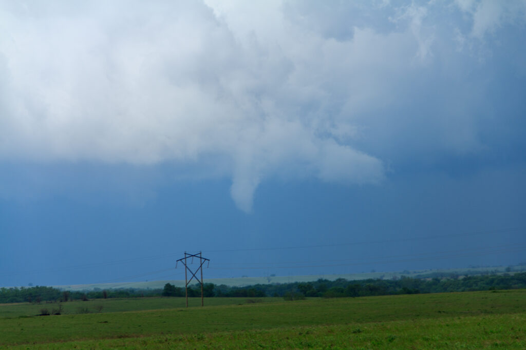 Small funnel that later turned into a very brief tornado