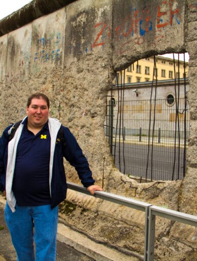 Me in front of the Berlin Wall