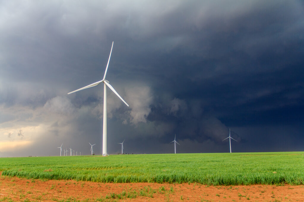 Wall Cloud behind windmills